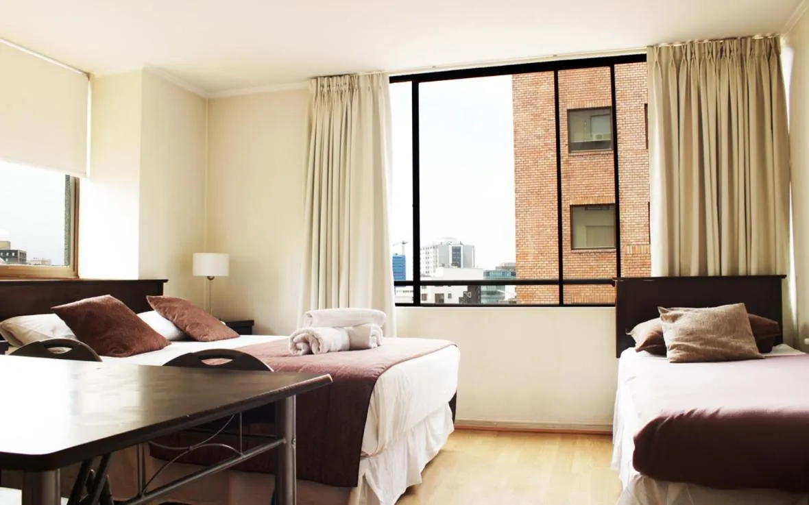 Photo of the whole room, Bed in Apartamentos Costanera Centre
