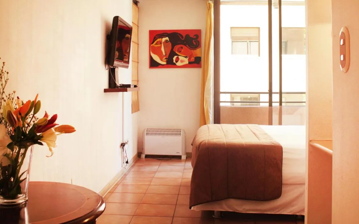 Photo of the whole room, Bed in Apartamentos Costanera Centre
