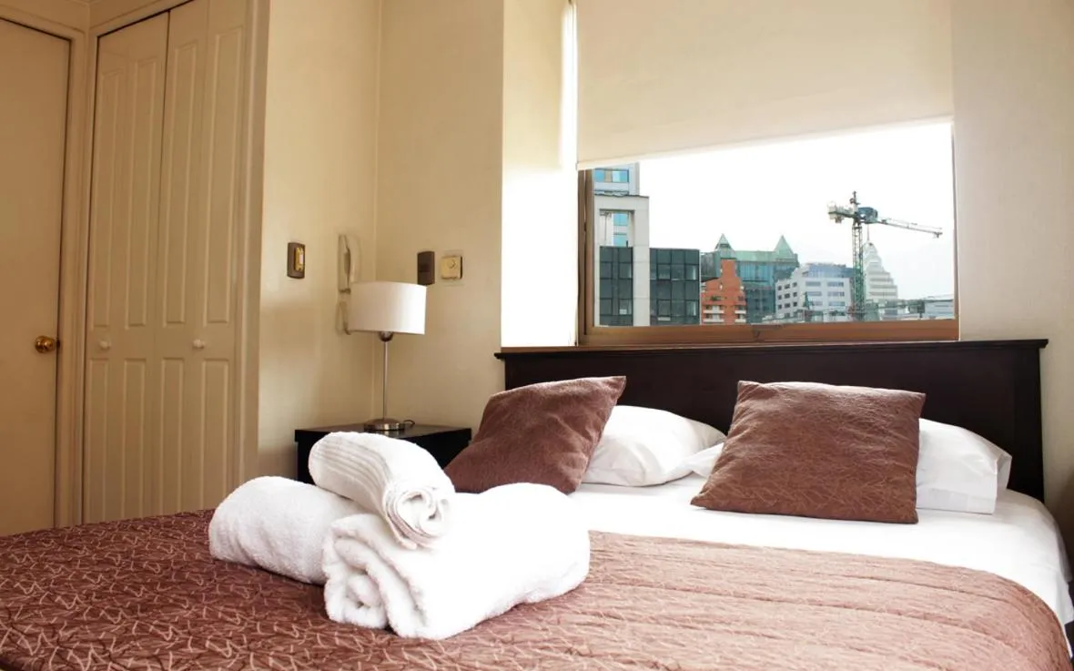 Bed in Apartamentos Costanera Centre