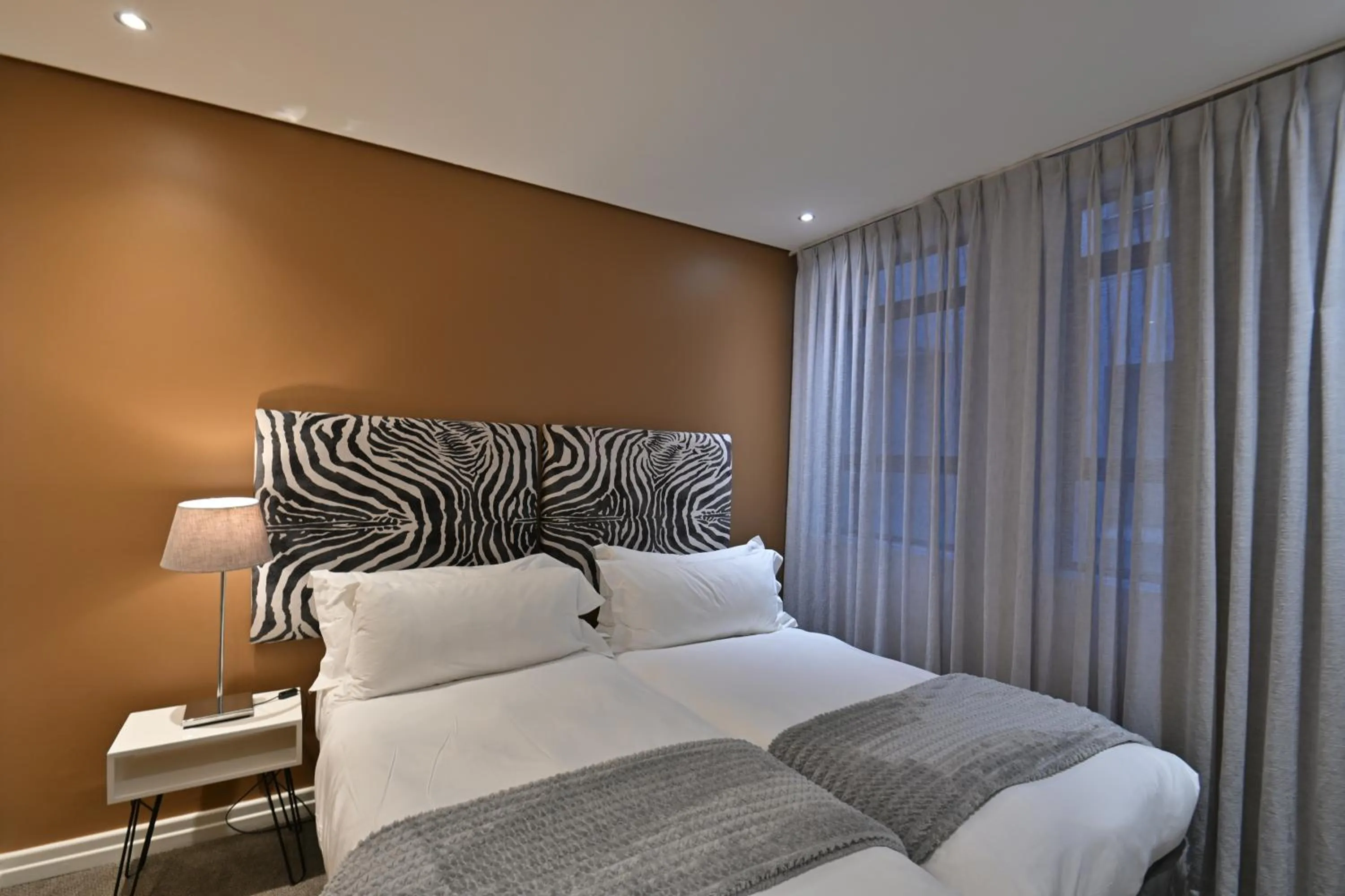 Bed in Fountains Hotel