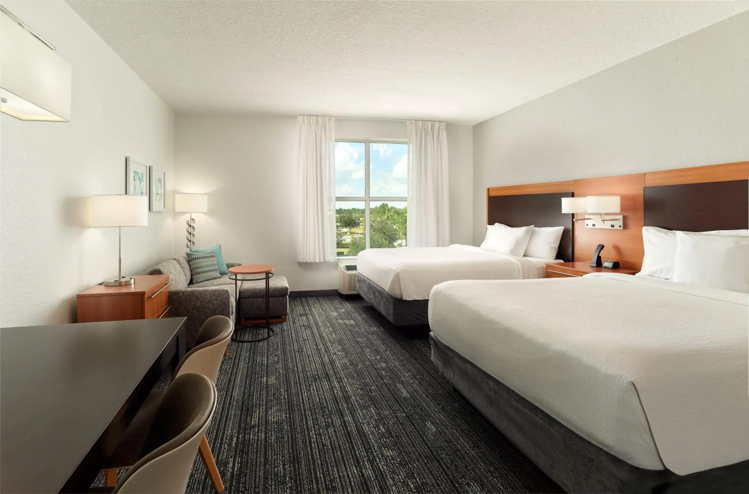 Queen Suite with Two Queen Beds - Firework View in TownePlace Suites Orlando at FLAMINGO CROSSINGS Town Center, Western Entrance Queen Suite with Two Queen Beds - Firework View in TownePlace Suites Orlando at FLAMINGO CROSSINGS Town Center, Western Entrance