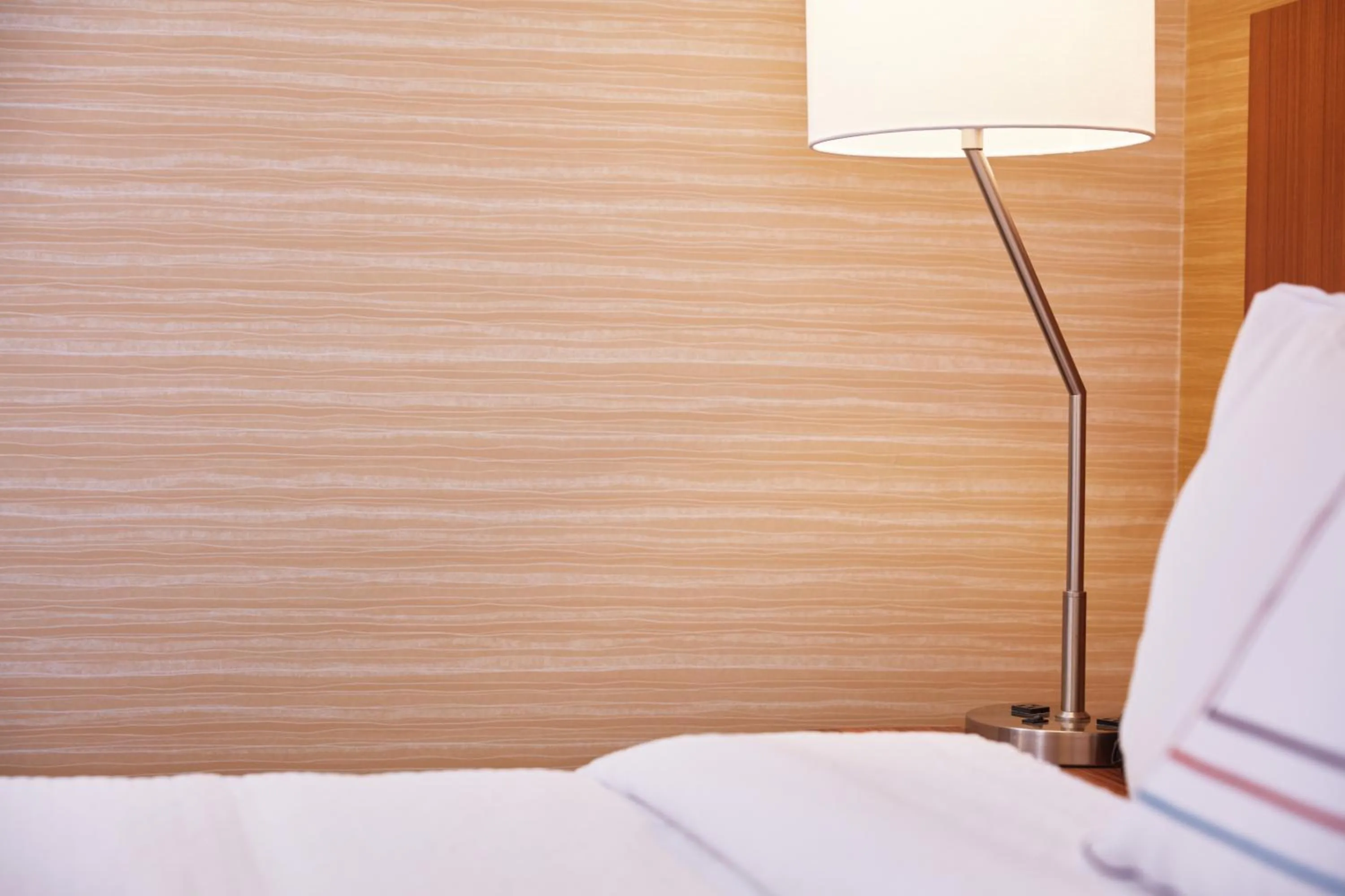 Bed in Fairfield Inn & Suites by Marriott Rawlins