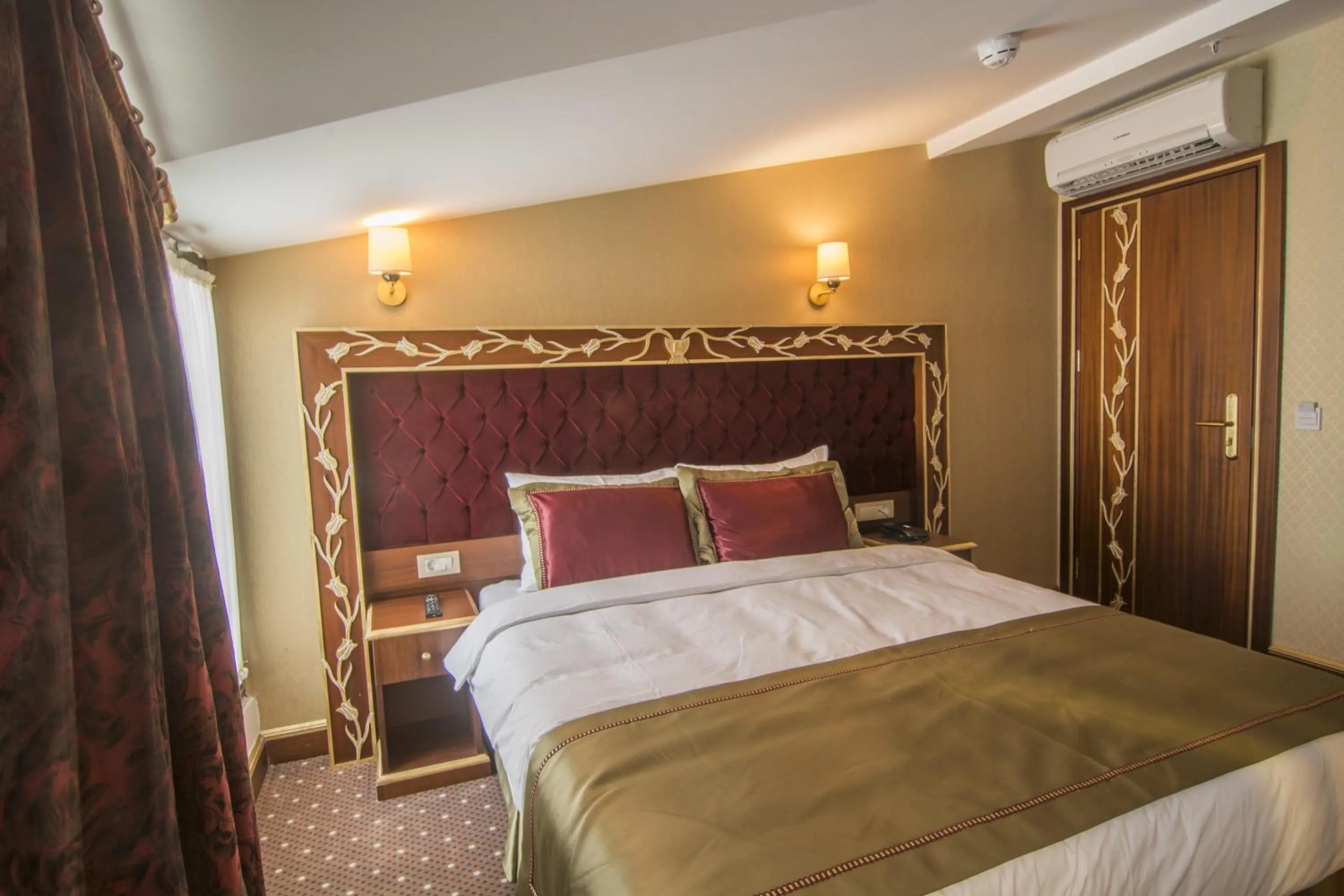 Bedroom in MB Deluxe Hotel