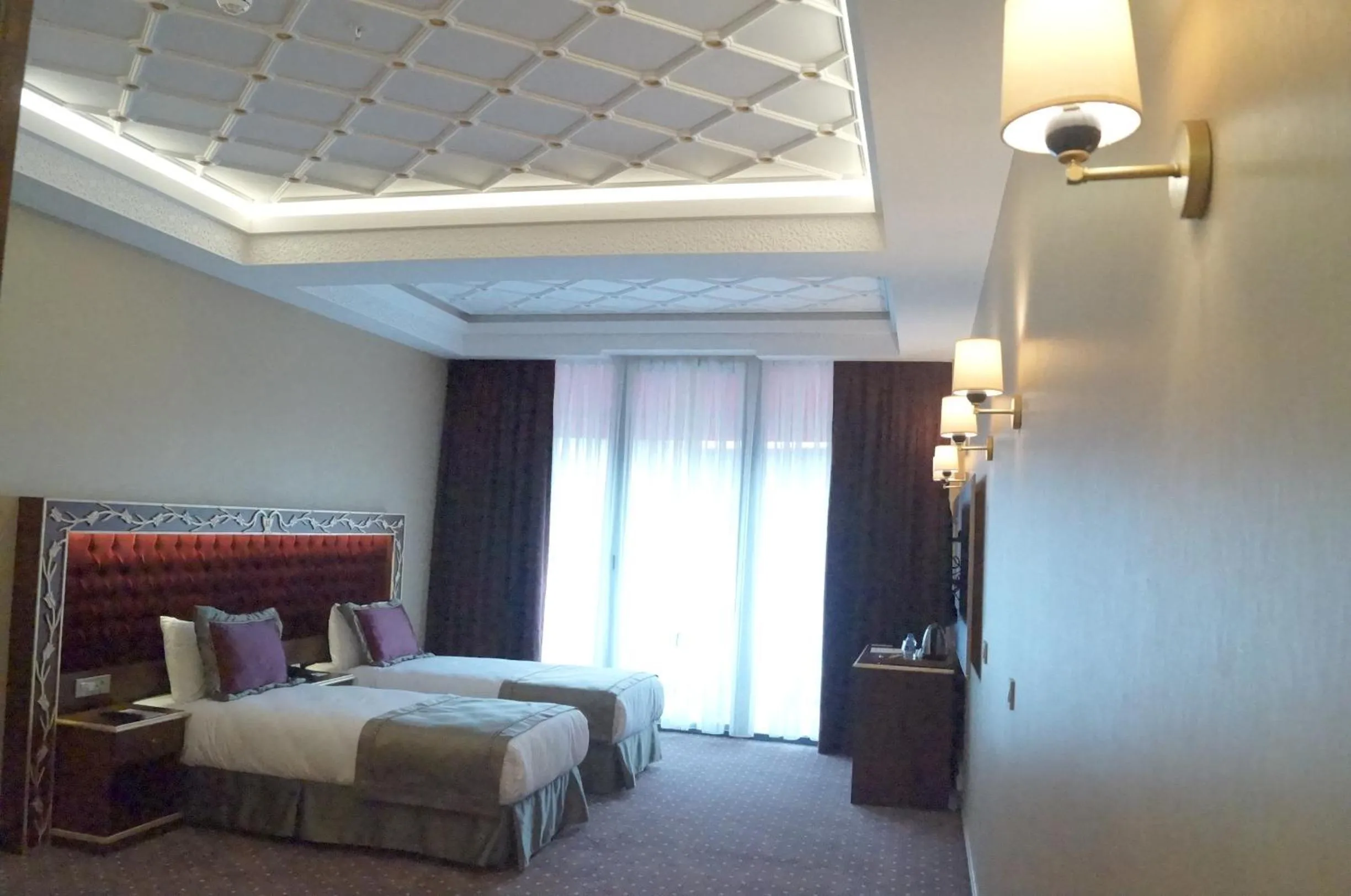 Bed, Room Photo in MB Deluxe Hotel