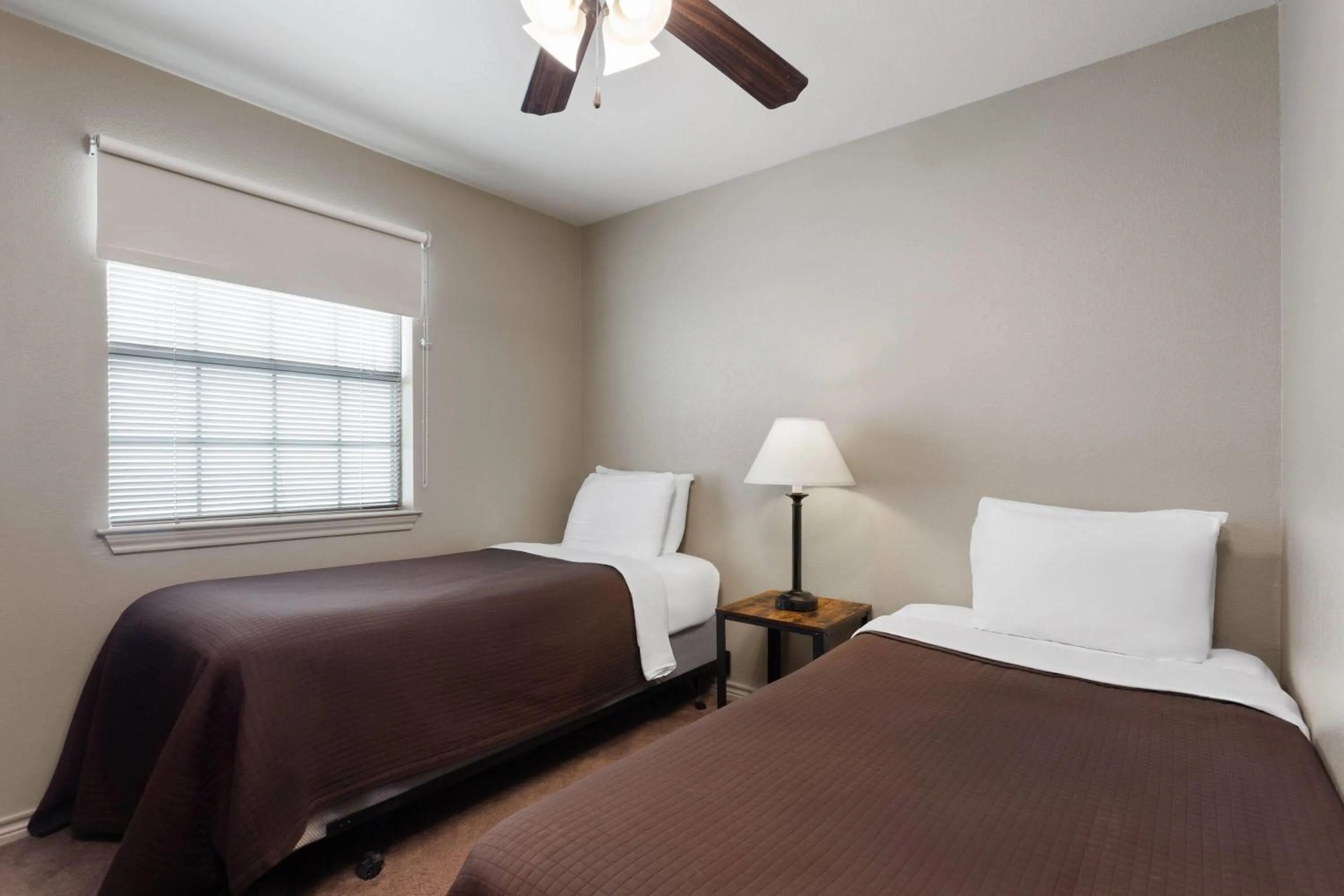 Bed in Eagle's Den Suites Big Spring a Travelodge by Wyndham