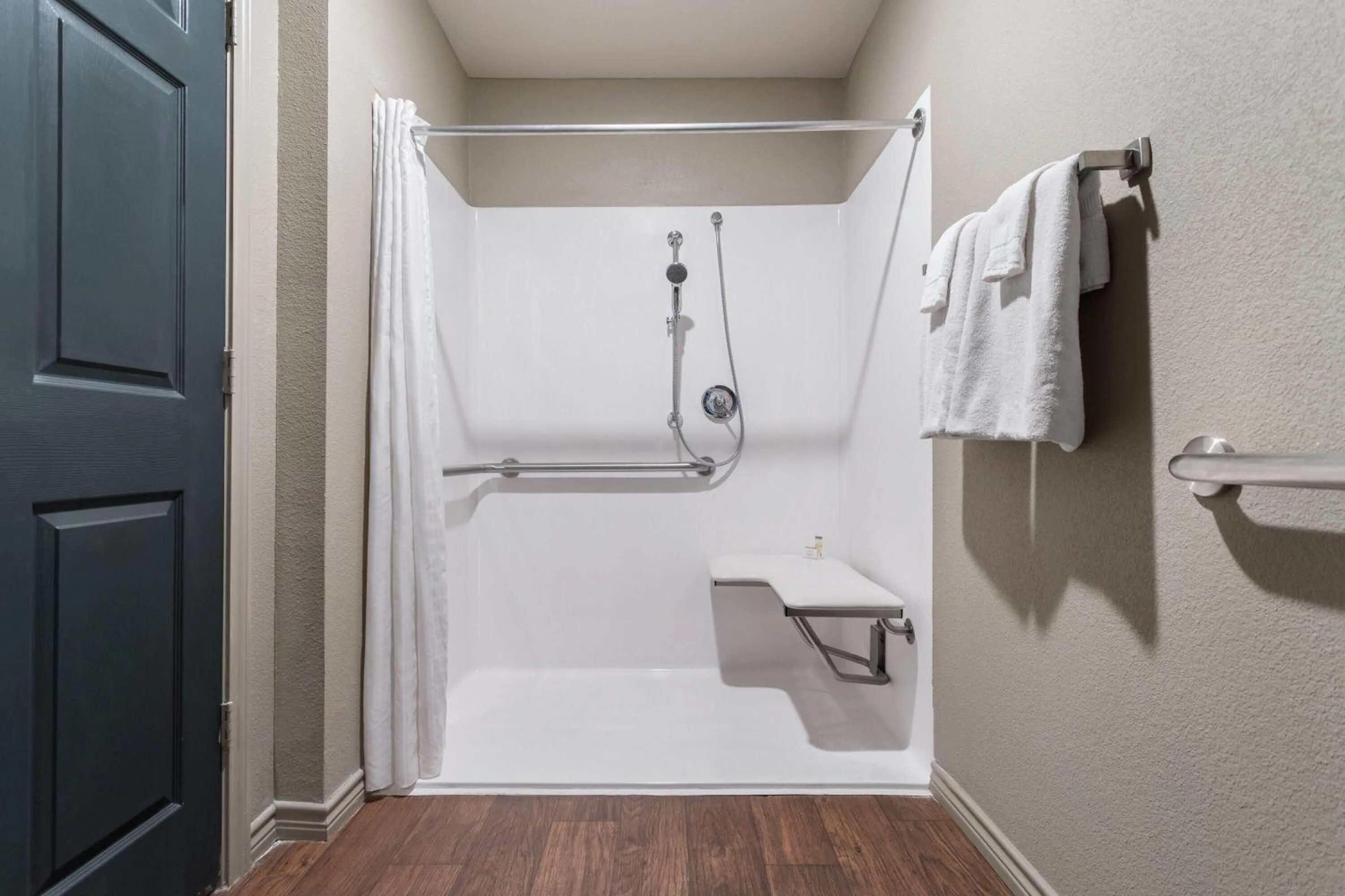 Shower in Eagle's Den Suites Big Spring a Travelodge by Wyndham