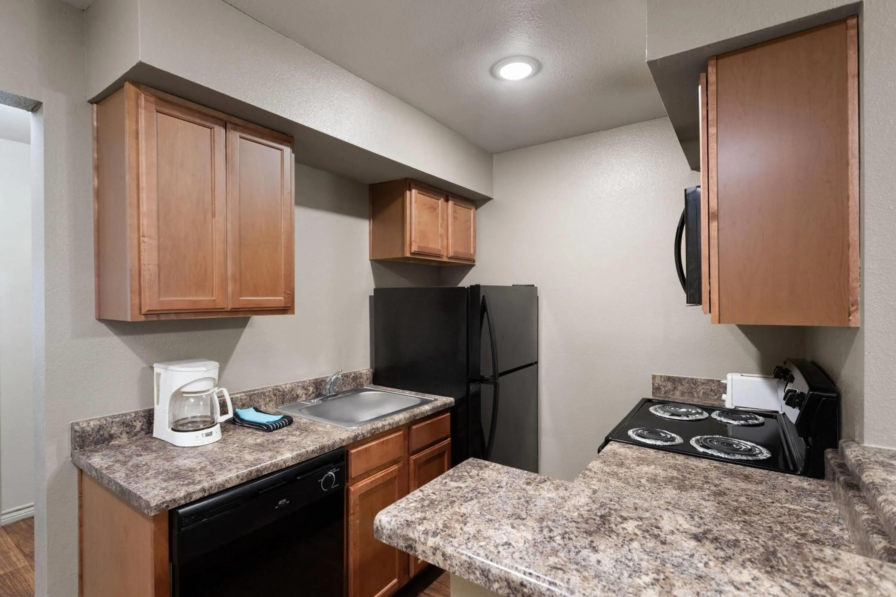 Photo of the whole room in Eagle's Den Suites Big Spring a Travelodge by Wyndham