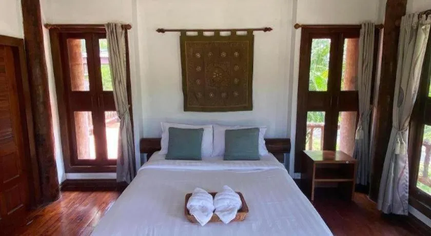 Bed in Khaopubpa Resort