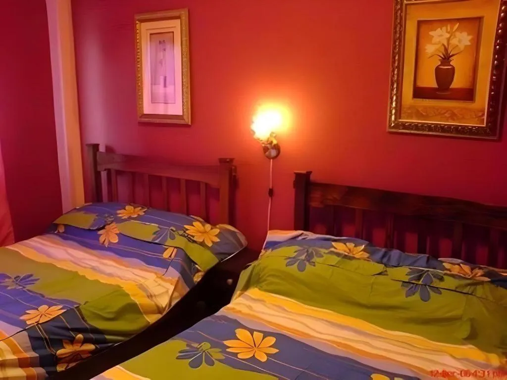 Bed in Tamaraw Beach Resort