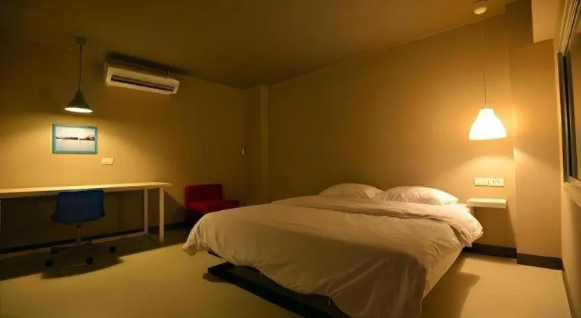 Bed in Sabye D Resort at Surat