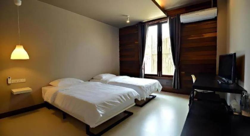 Bed in Sabye D Resort at Surat