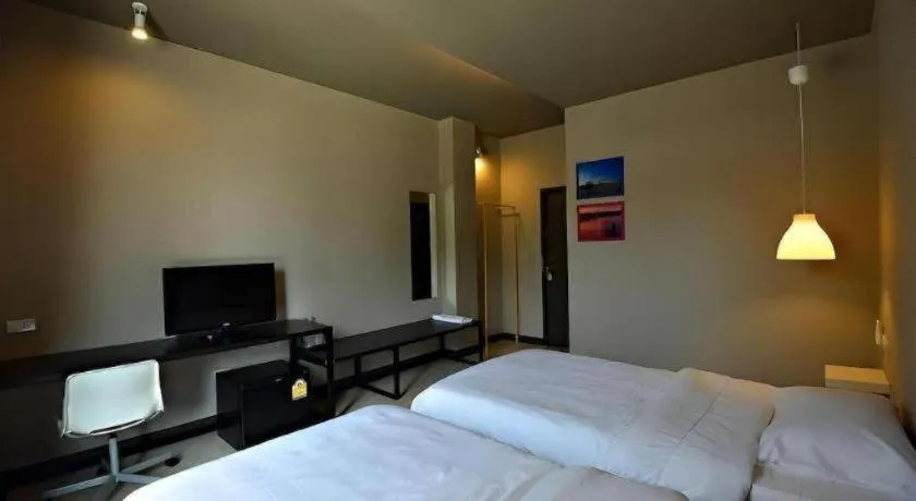 Bed in Sabye D Resort at Surat