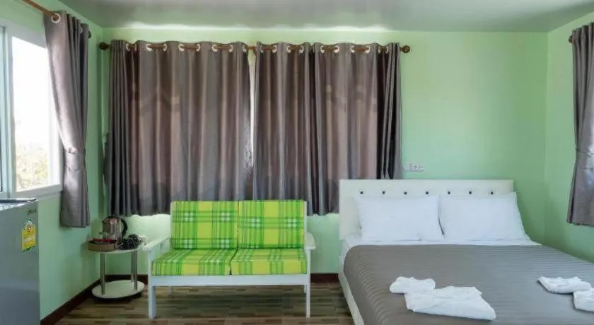 Bed in Baan Tem Jai Khao Yai