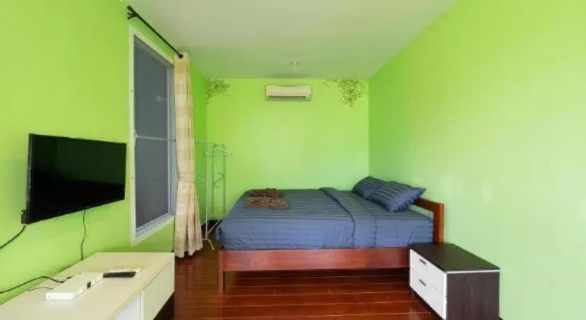 Bed in Baan Tem Jai Khao Yai