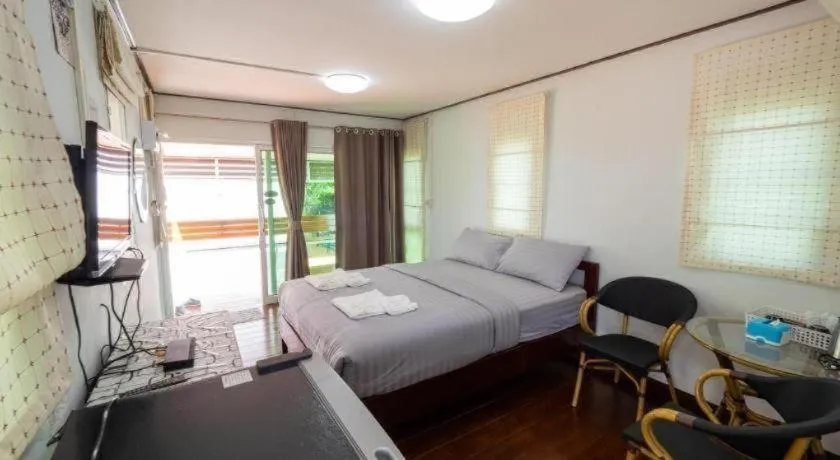 Bed in Baan Tem Jai Khao Yai