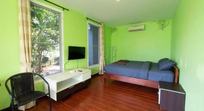 Bed in Baan Tem Jai Khao Yai