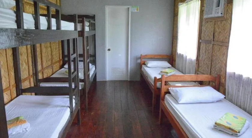 Bed in Sanctuary Garden Resort