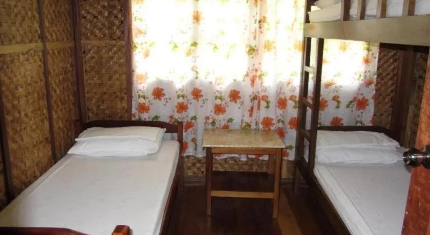Bed in Sanctuary Garden Resort