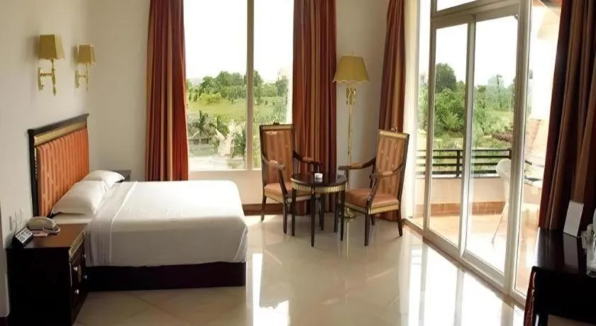 Bed in Pragati Green Meadows and Resort