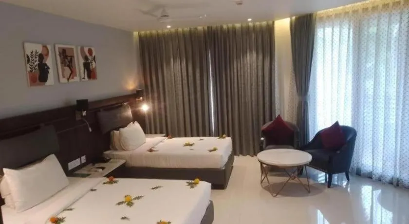 Bed in Pragati Green Meadows and Resort