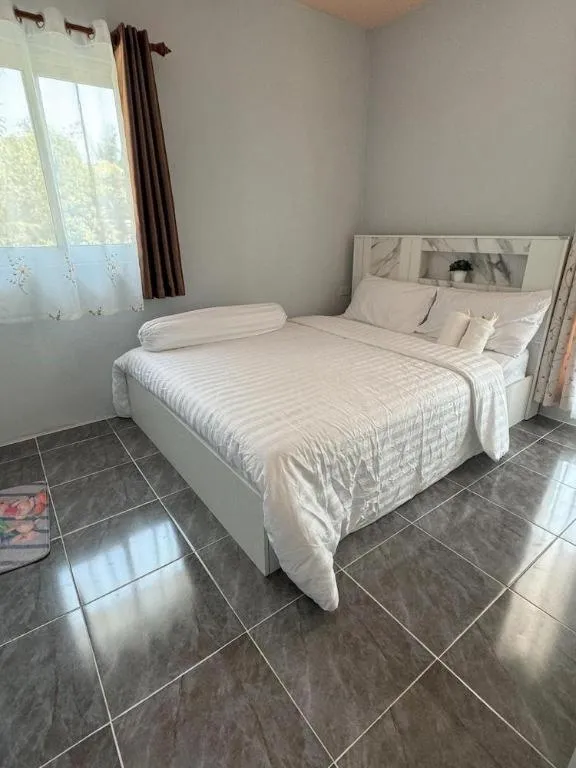 Bed in Sunshine Rest Resort