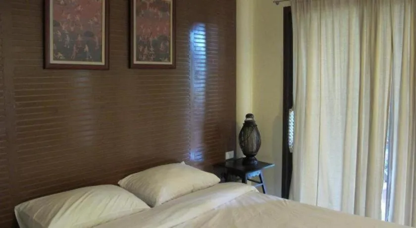 Bed in Baan Suan Amphawa