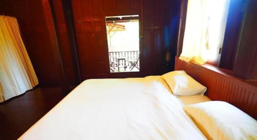 Bed in Baan Suan Amphawa