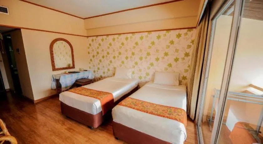 Bed in Haad Kaew Resort Songkhla