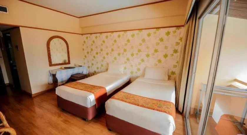 Bed in Haad Kaew Resort Songkhla