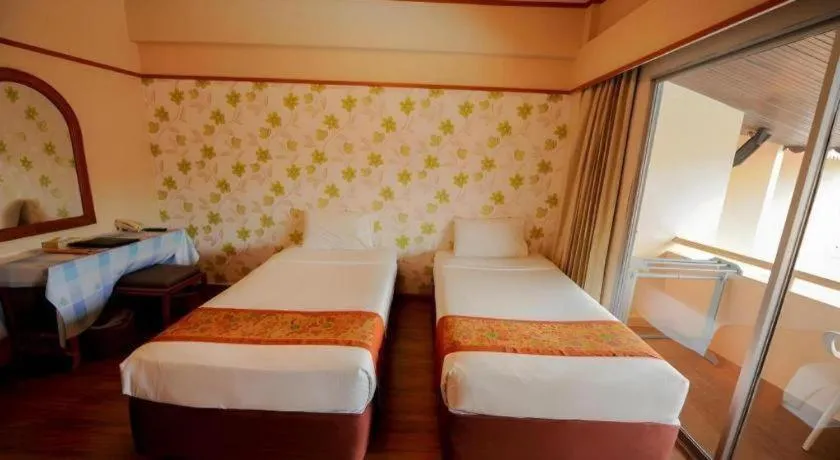 Bed in Haad Kaew Resort Songkhla