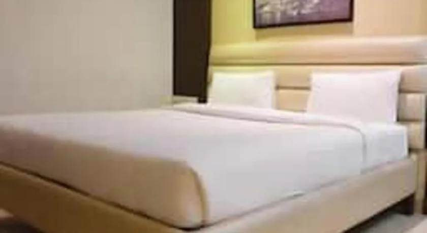 Bed in Hotel J.S. Residency