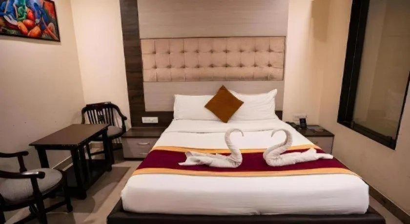 Bed in Hotel J.S. Residency