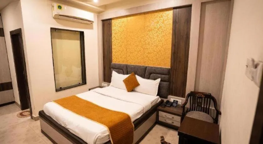 Bed in Hotel J.S. Residency