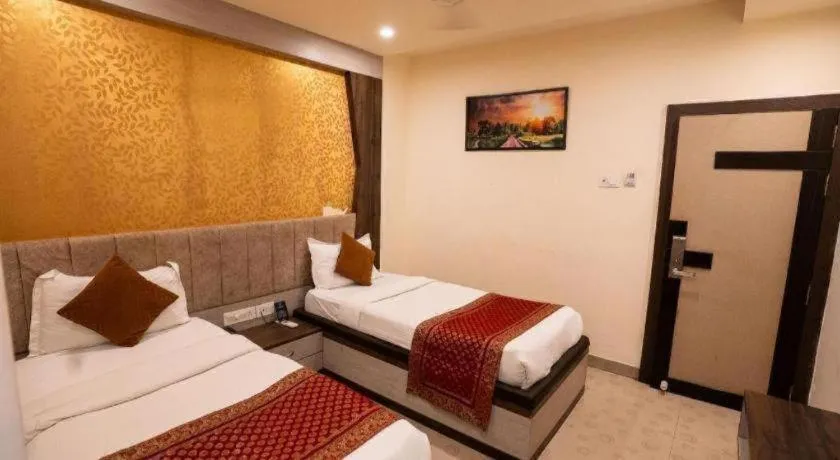 Bed in Hotel J.S. Residency