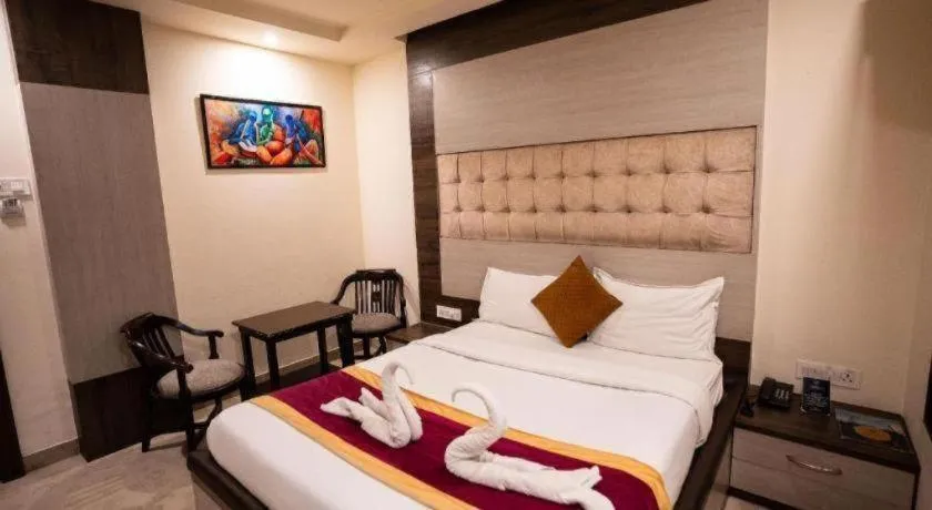 Bed in Hotel J.S. Residency