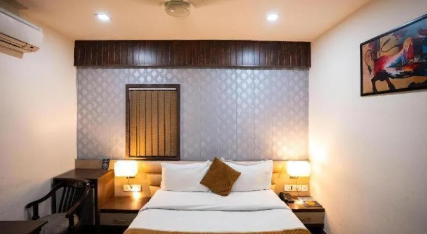 Bed in Hotel J.S. Residency