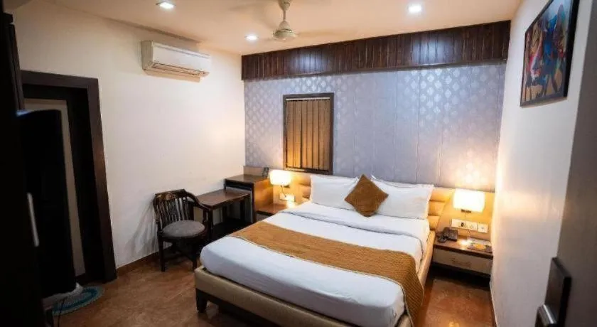 Bed in Hotel J.S. Residency