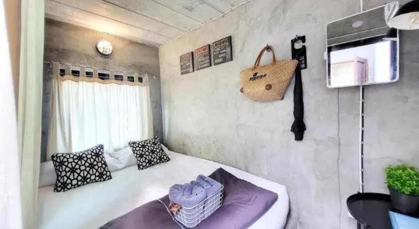 Bed in PAUSE Resort & Bar