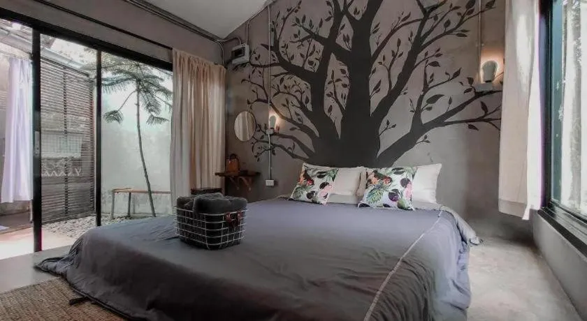 Bed in PAUSE Resort & Bar