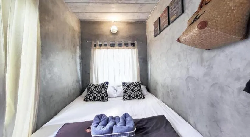 Bed in PAUSE Resort & Bar