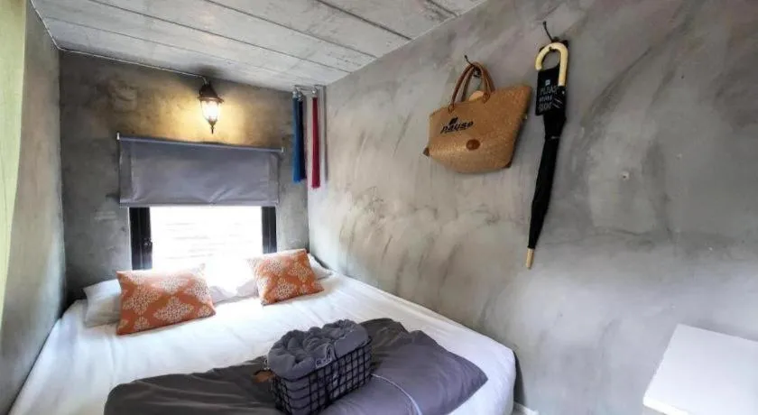 Bed in PAUSE Resort & Bar