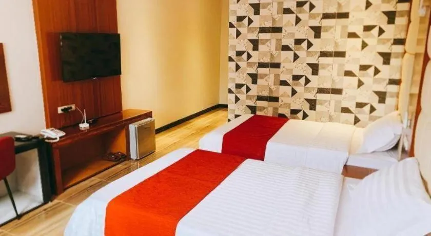 Bed in STARVIEW HOTEL AND RESORT
