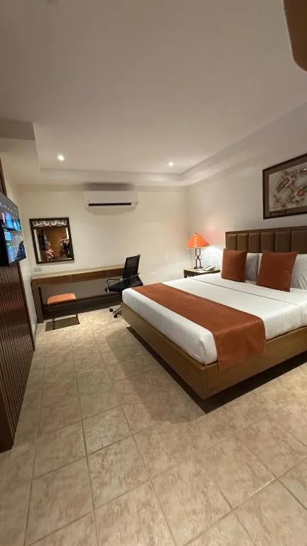 Bed in By the Sea Resort Hotel