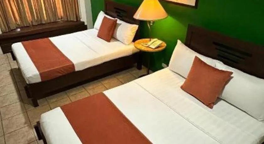 Bed in By the Sea Resort Hotel