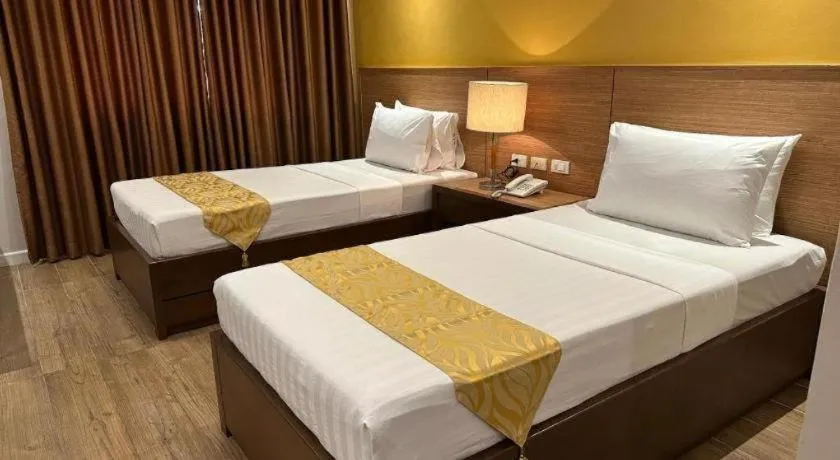 Bed in By the Sea Resort Hotel