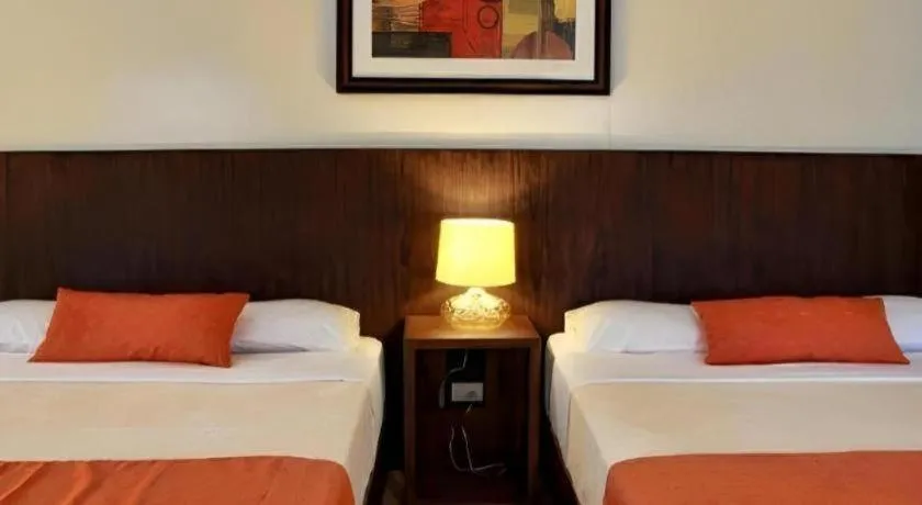 Bed in Batis Aramin Resort And Hotel Corp.