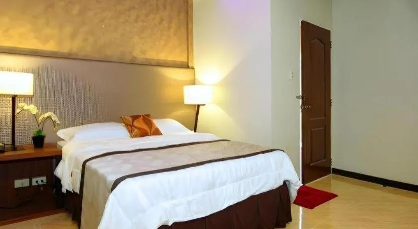 Bed in Batis Aramin Resort And Hotel Corp.