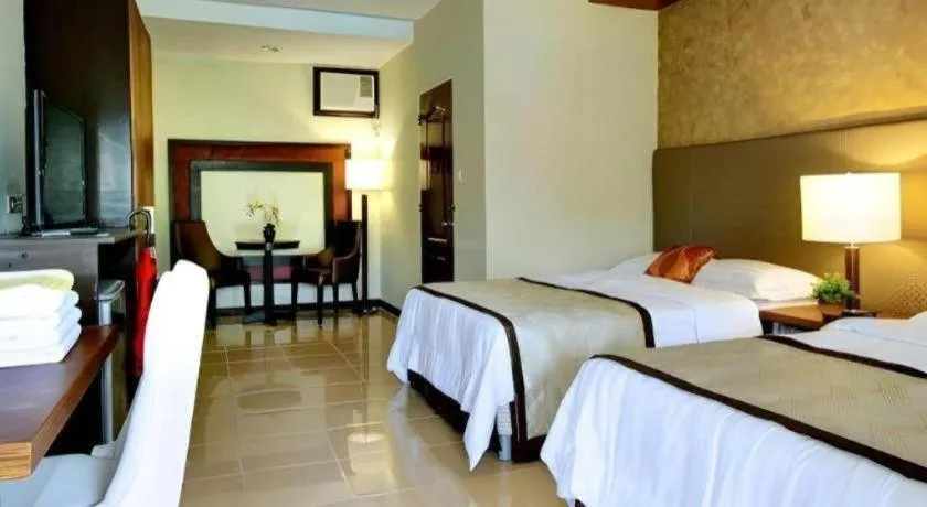 Bed in Batis Aramin Resort And Hotel Corp.