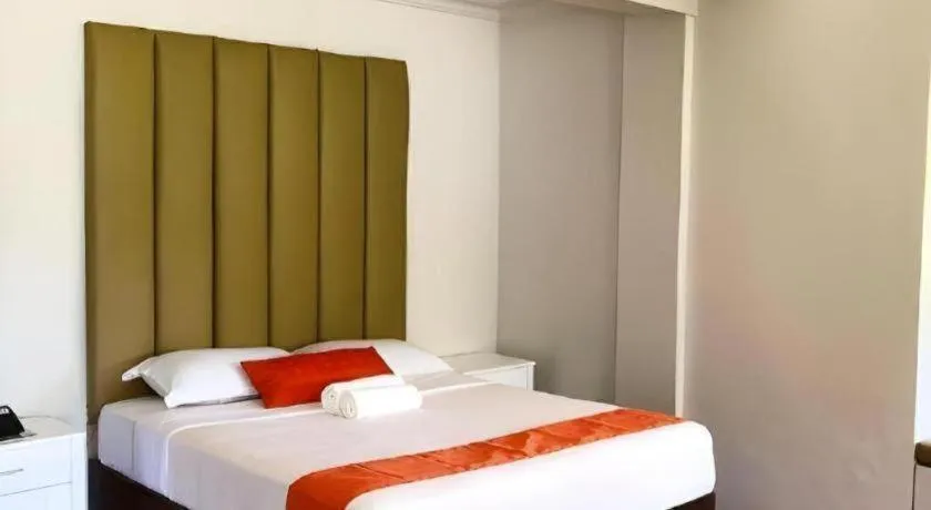 Bed in Batis Aramin Resort And Hotel Corp.