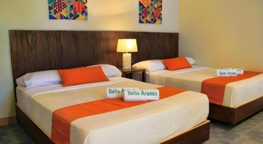 Bed in Batis Aramin Resort And Hotel Corp.